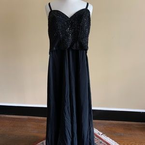 Black evening gown with beaded top and straps